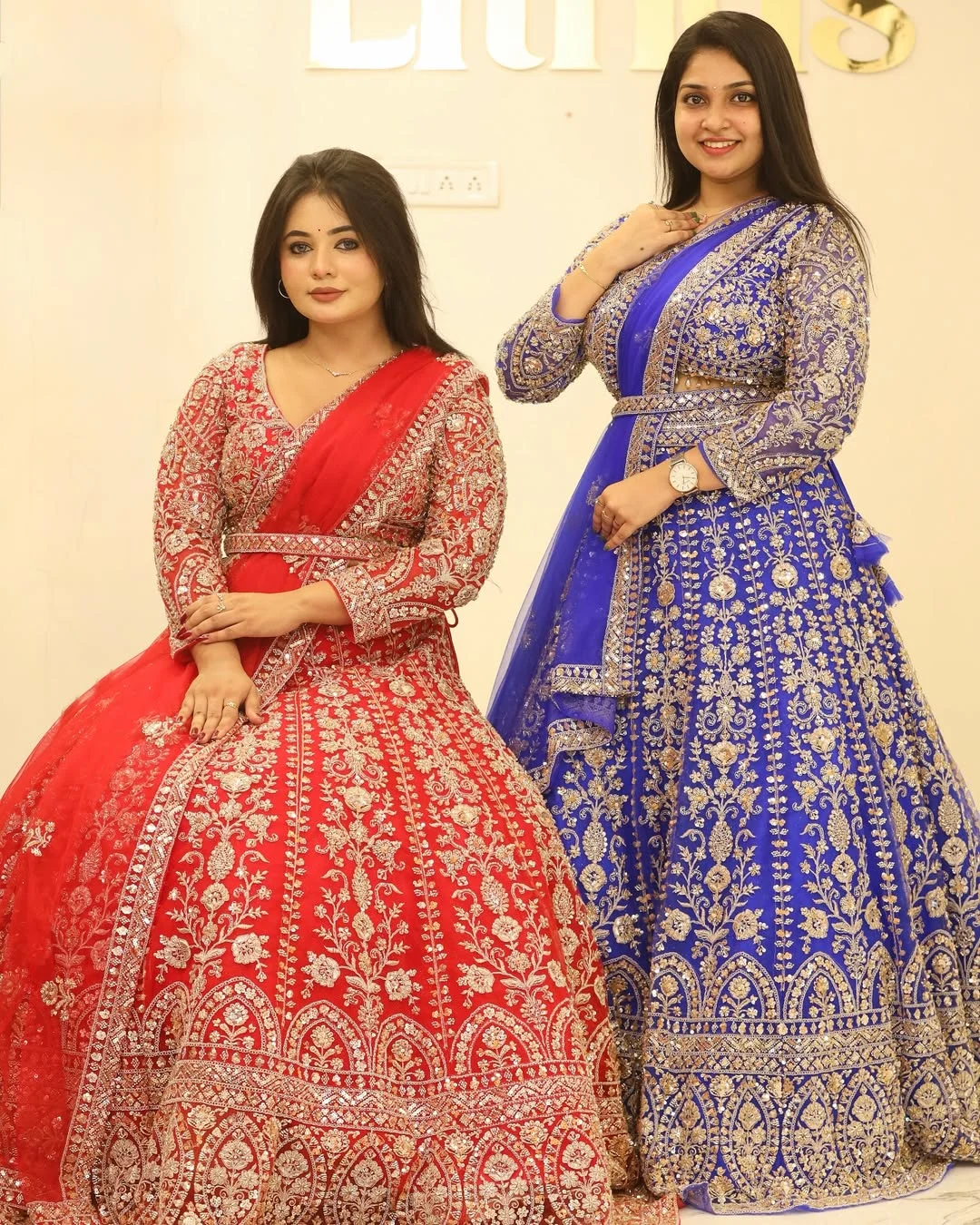 Couple in stylish Indo-Western fusion wedding rental outfits