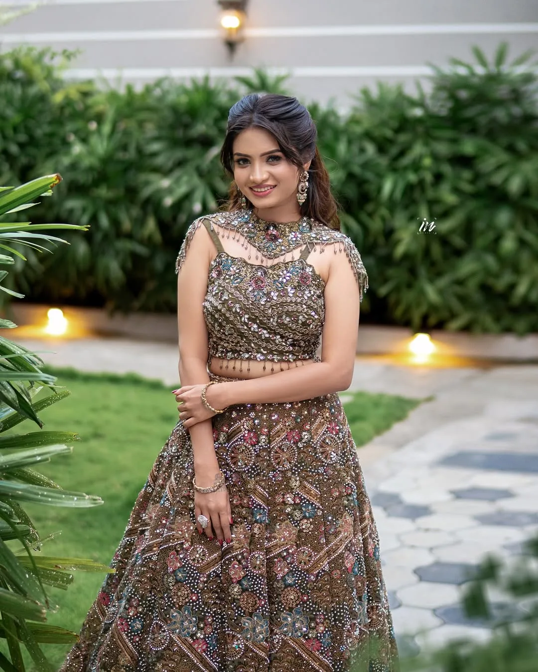 Detailed view of a red bridal lehenga for rent